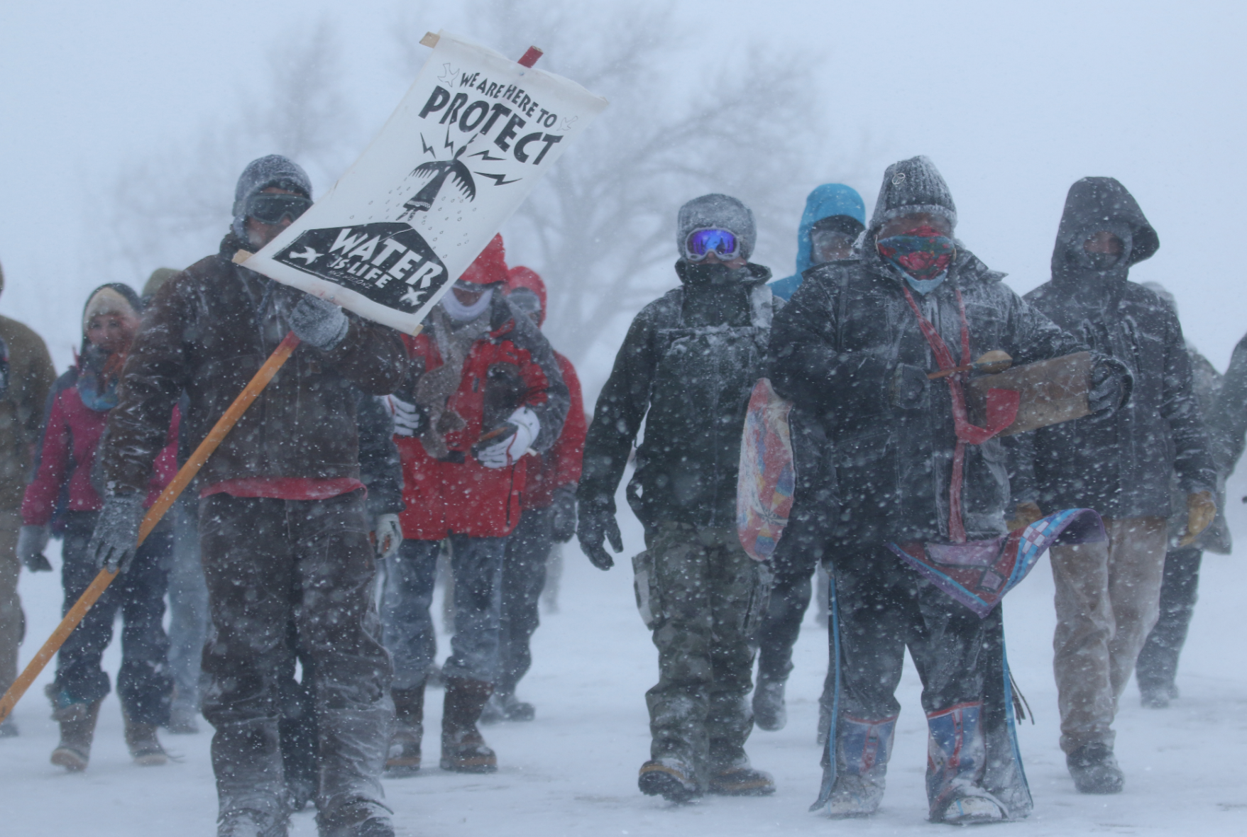 Colville tribal member Dan Nanamkin and Billy Drywater march to Backwater Bridge in December 2016.